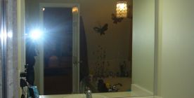 Standard mirror in master bathroom before framing